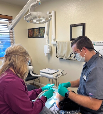 Dahle Family Dentistry our dentist performing a dental implant procedure